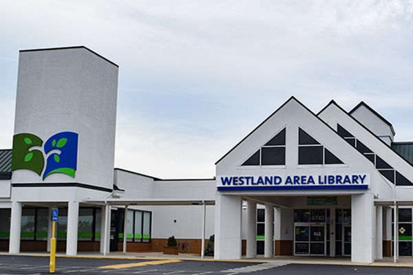 Exterior image of the front entrance of the Westland Area Library taken from the parking lot of of Broad Street.