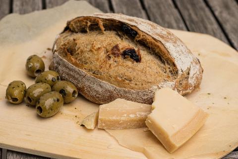 Image of sourdough bread with cheese and olives