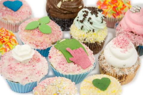 variety of decorated cupcakes