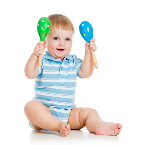 Toddler shaking maracas