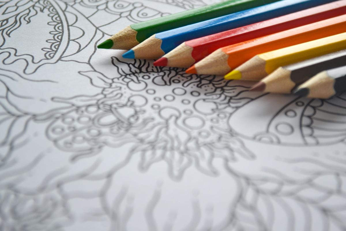 coloring page with assorted sharpened coloring pencils 